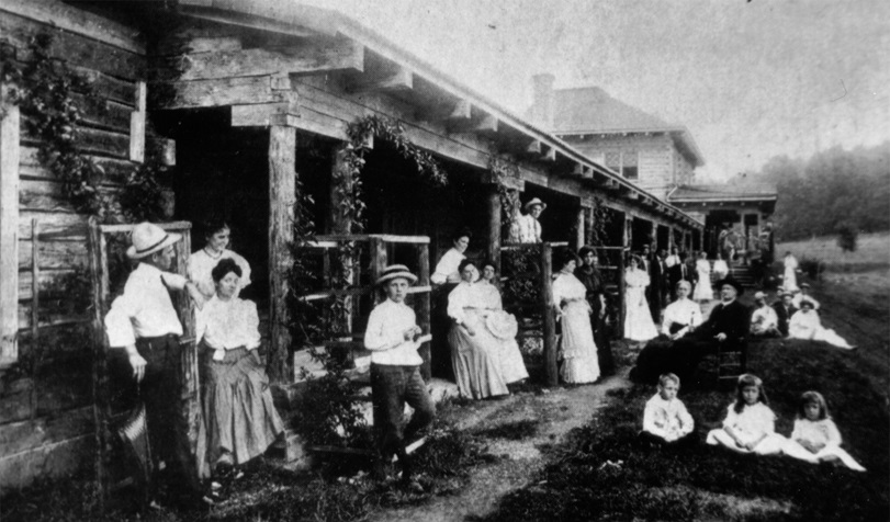Tourists Relax in Front of Missouri Row Circa 1910